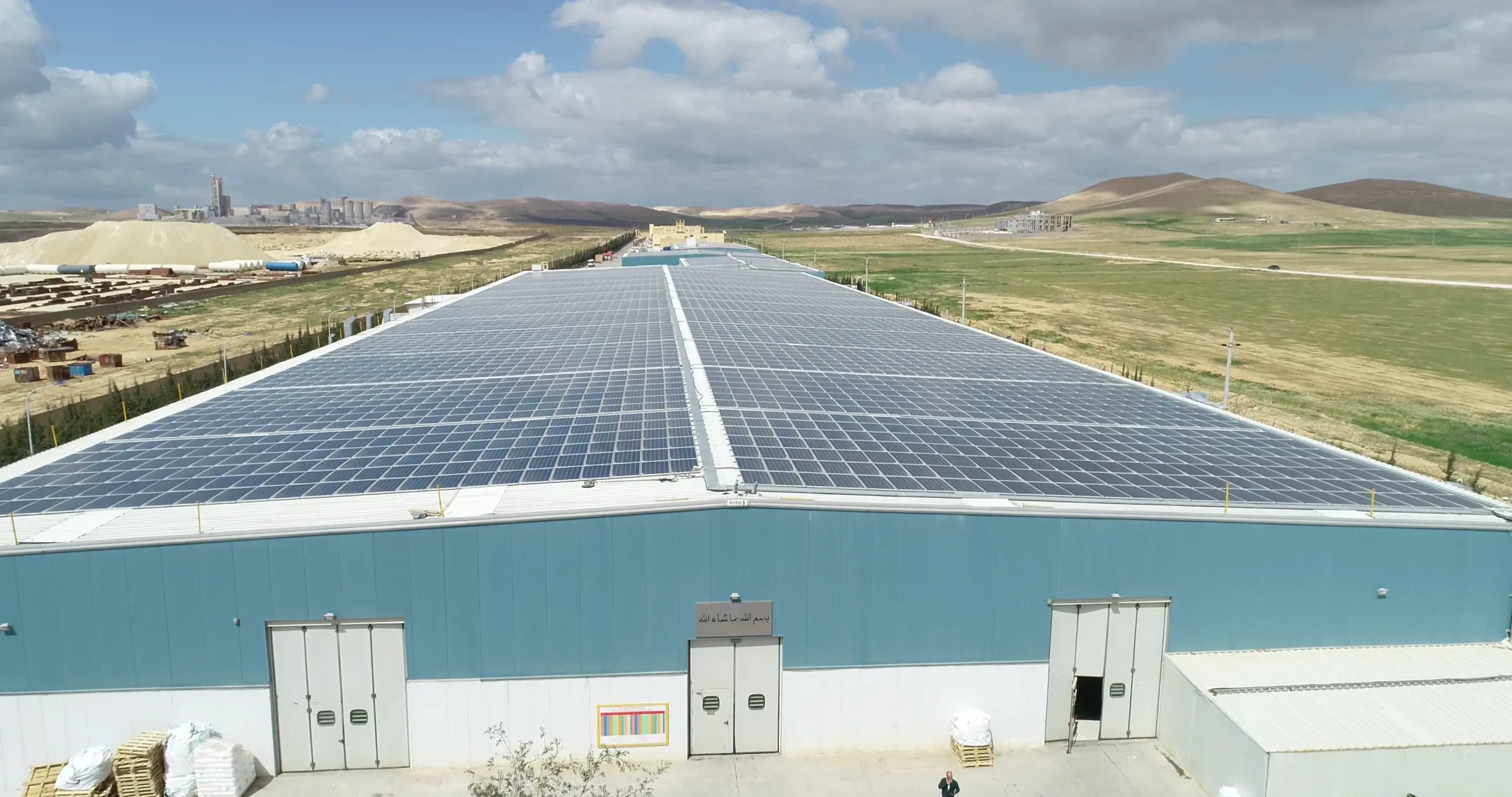 Rooftop Magnelis mounting structure under solar modules at Giant Industrial Group